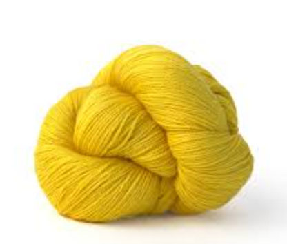 Yellow skein of yarn on a white background
